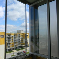 Остекление балкона и терассы, ул. Данченко, Киев.  Алюминиевая складная система TIARA TWIN (Albert Genau), алюминиевая подъемно-раздвижная система М300 (